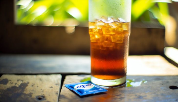 Glass of iced tea with Equal sweetener