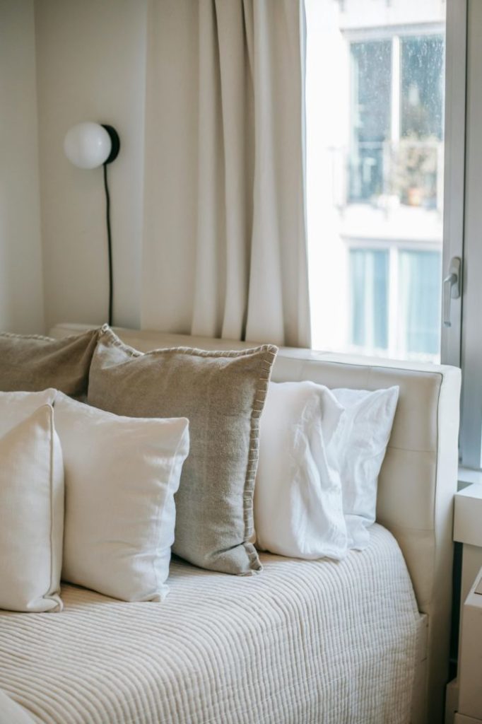 Photo by Charlotte May: https://www.pexels.com/photo/bedroom-interior-with-soft-cushions-on-bed-at-home-5825567/