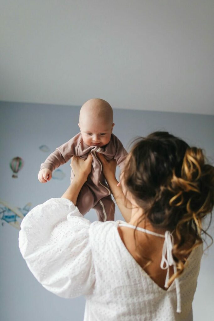 Photo by Polina Tankilevitch: https://www.pexels.com/photo/woman-in-white-top-carrying-baby-3875220/