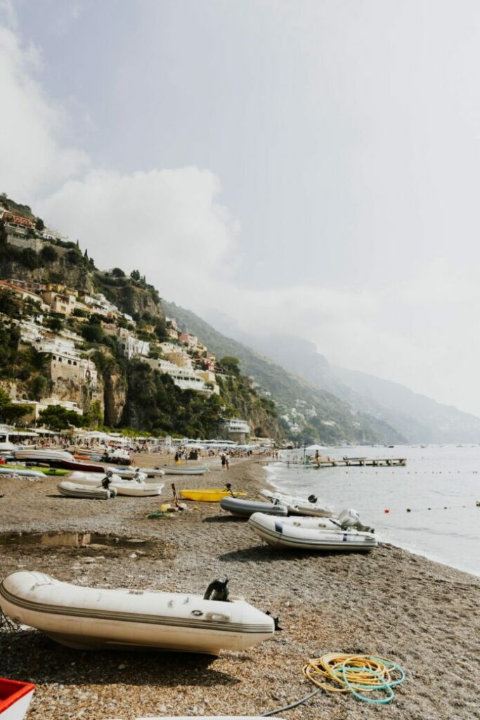 Photo by Kelly    : https://www.pexels.com/photo/inflatable-boats-on-sandy-beach-of-positano-19143062/