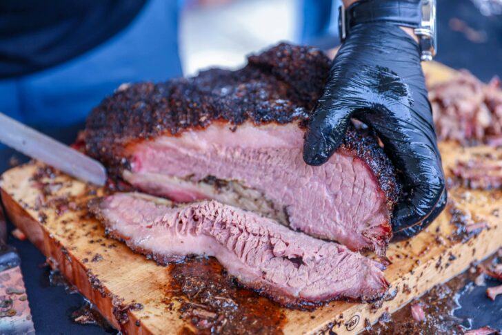 Photo by Hayden Walker: https://www.pexels.com/photo/a-person-slicing-barbecue-beef-brisket-9397270/